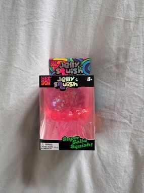 Nee Doh Jelly Squish Super Solid Squish Toy - Pink